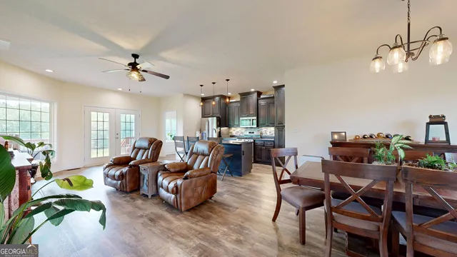 a kitchen with granite countertop stainless steel appliances and wooden cabinets