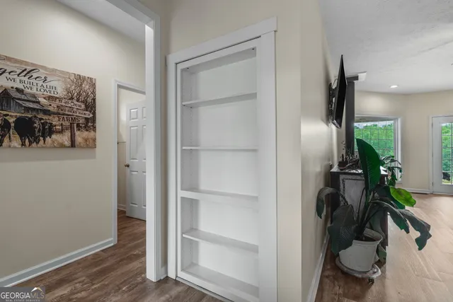 a view of a table and chairs in the garden