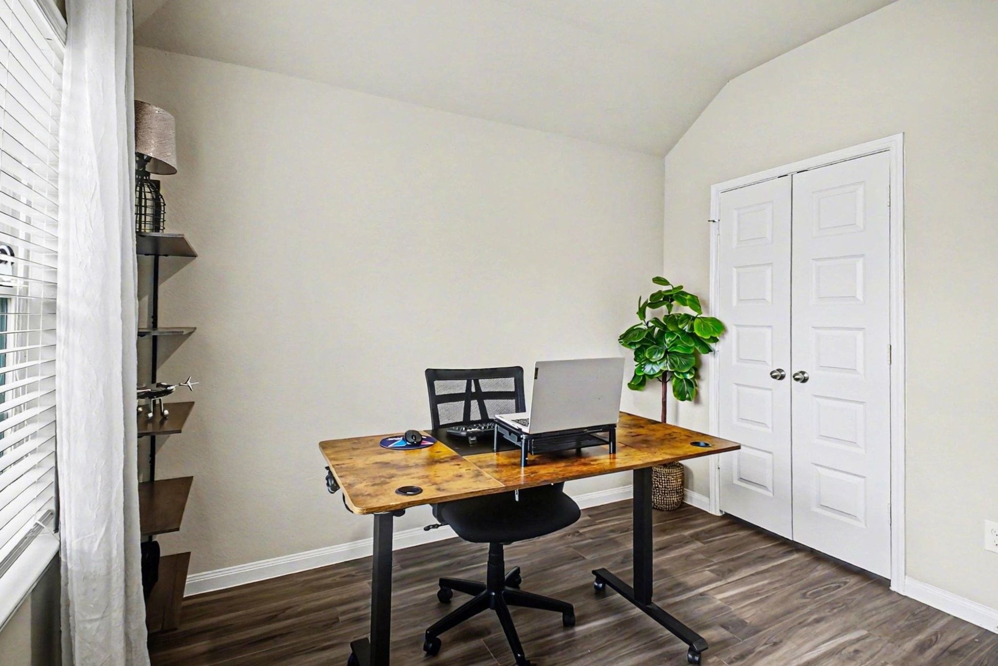 4906 Luke Matthew Drive Rosharon, TX 77583 - Photo 11 of 34 Bright front bedroom set up as home office with natural light and a double-door closet