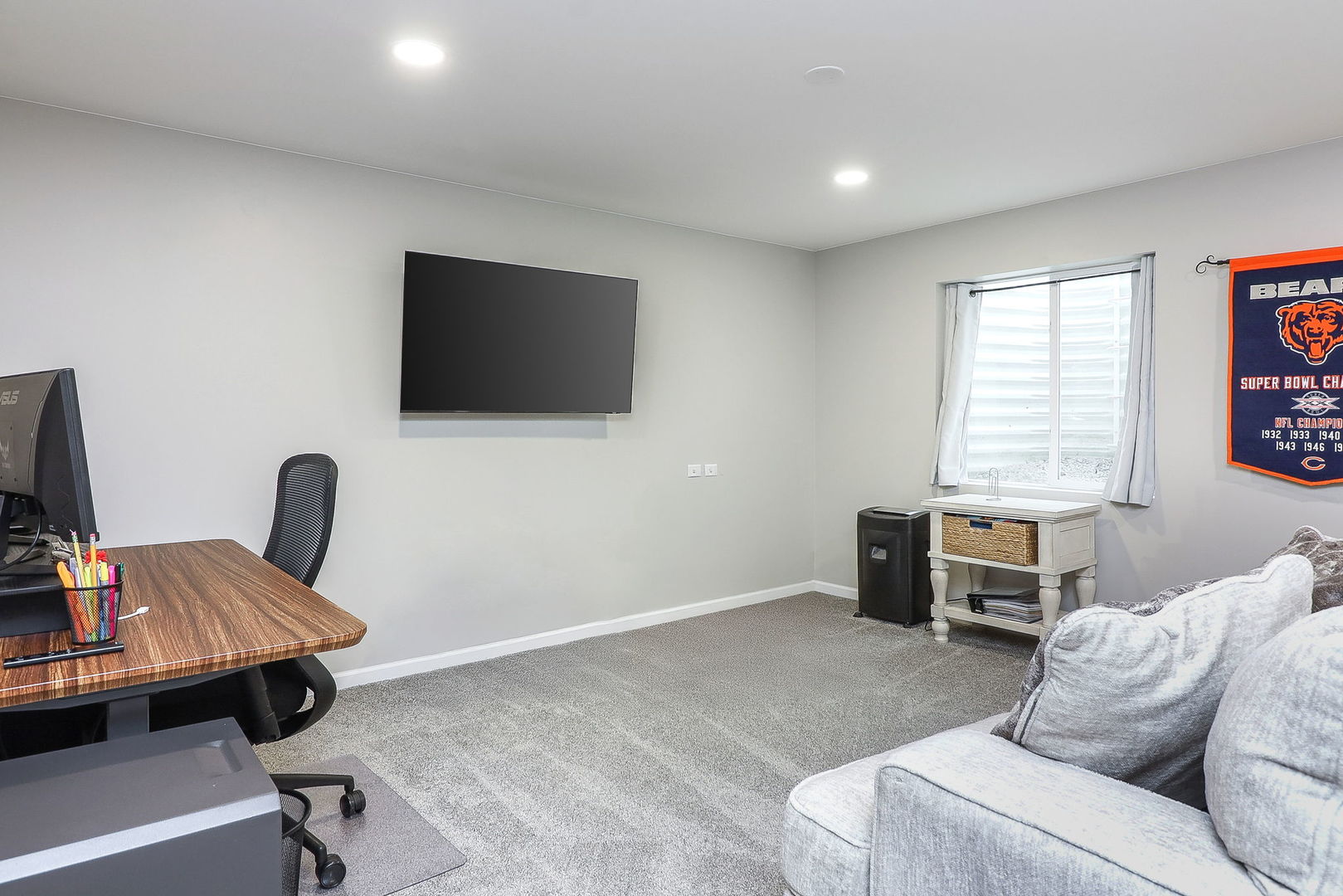 26537 West Countryside Lane Plainfield, IL 60585 - Photo 16 of 19 a living room with furniture and a flat screen tv