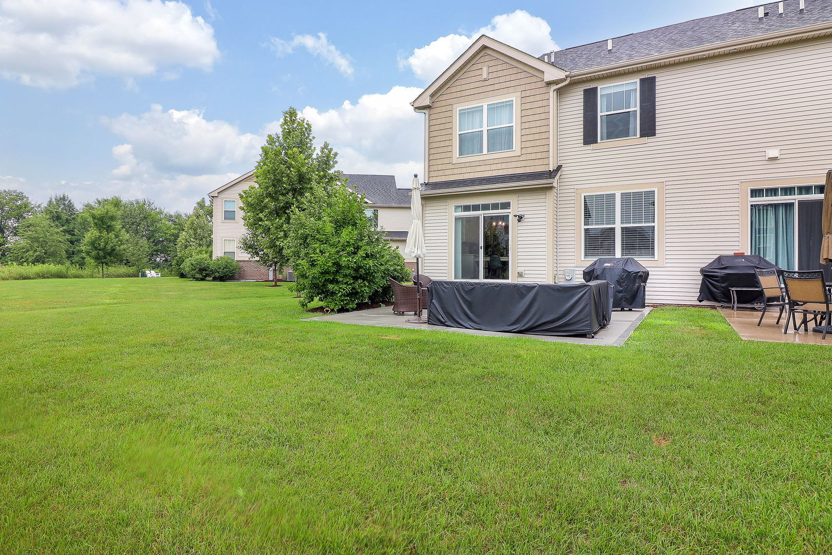 26537 West Countryside Lane Plainfield, IL 60585 - Photo 19 of 19 a view of a house with a backyard