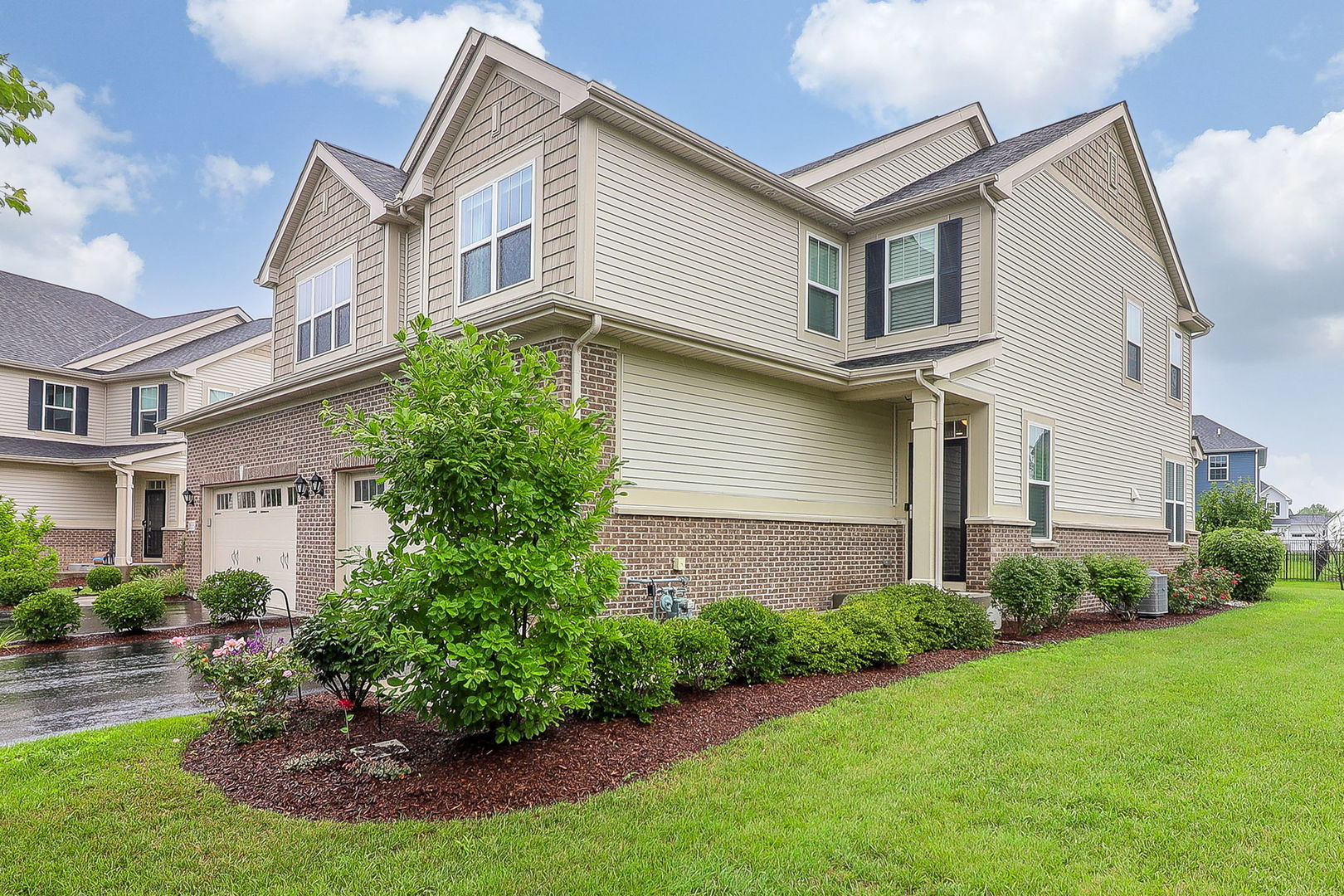 26537 West Countryside Lane Plainfield, IL 60585 - Photo 2 of 19 a view of a white house next to a yard