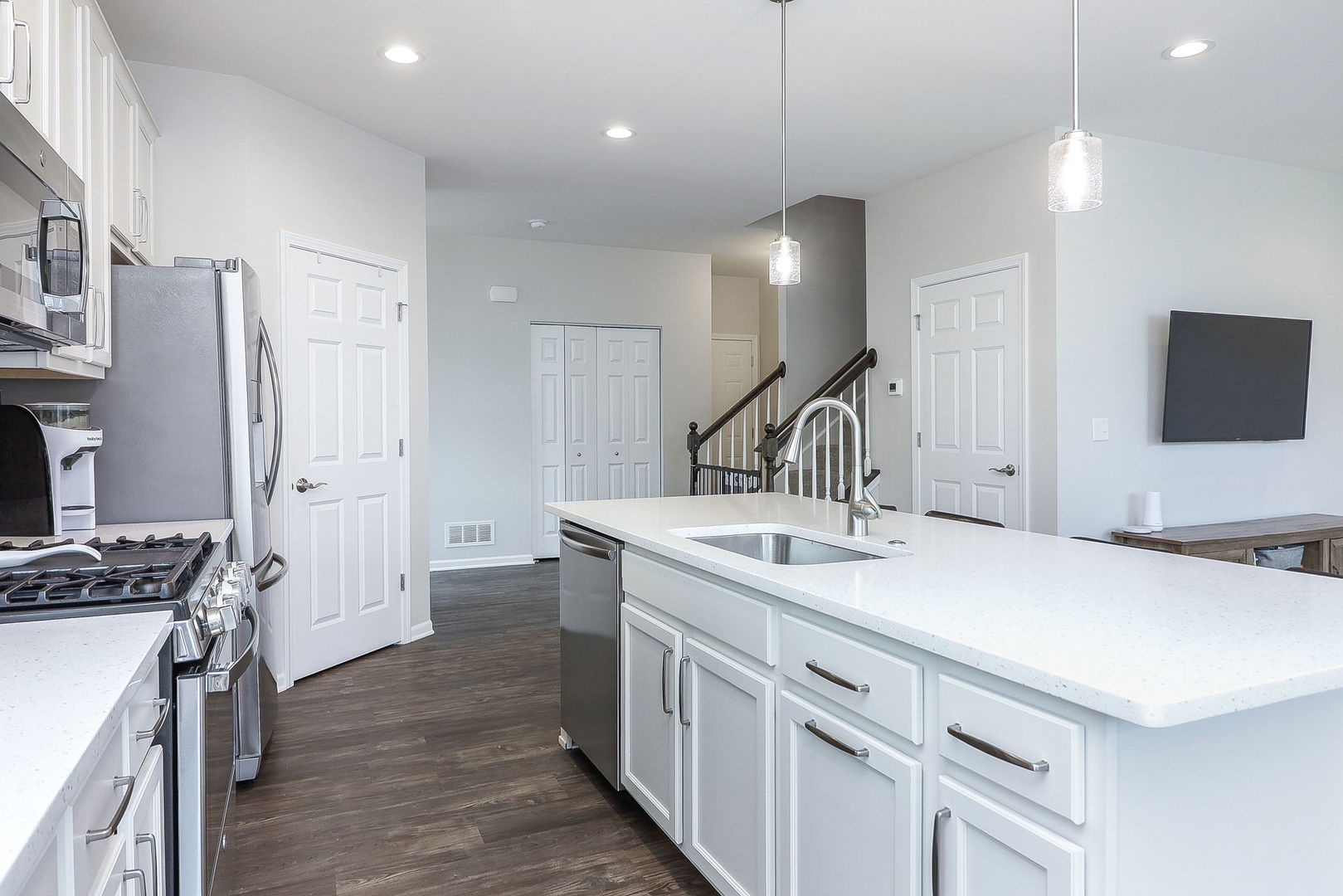 26537 West Countryside Lane Plainfield, IL 60585 - Photo 4 of 19 a kitchen that has a sink a stove and a refrigerator