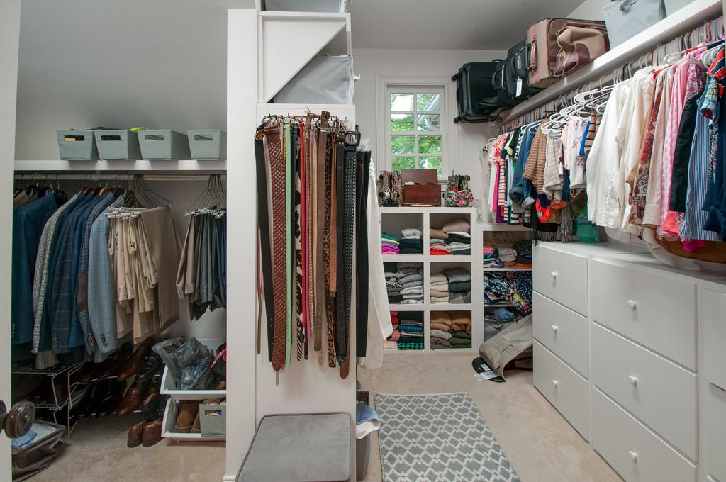 406 Page Road Nashville, TN 37205 - Photo 12 of 22 a view of walk in closet with clothes and shoes