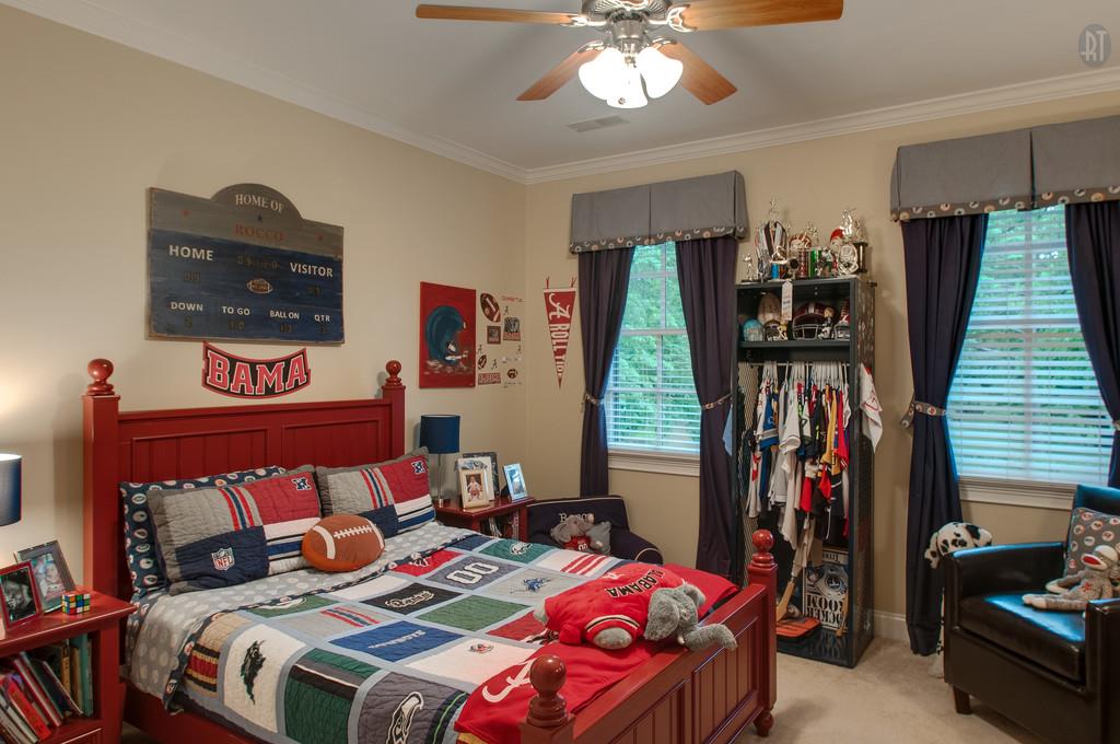 406 Page Road Nashville, TN 37205 - Photo 15 of 22 a bedroom with a bed a flat screen tv and dresser