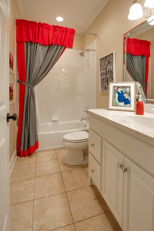 406 Page Road Nashville, TN 37205 - Photo 16 of 22 a bathroom with a toilet sink and mirror