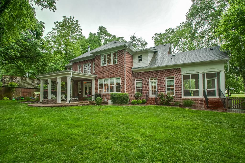406 Page Road Nashville, TN 37205 - Photo 21 of 22 a front view of a house with a yard
