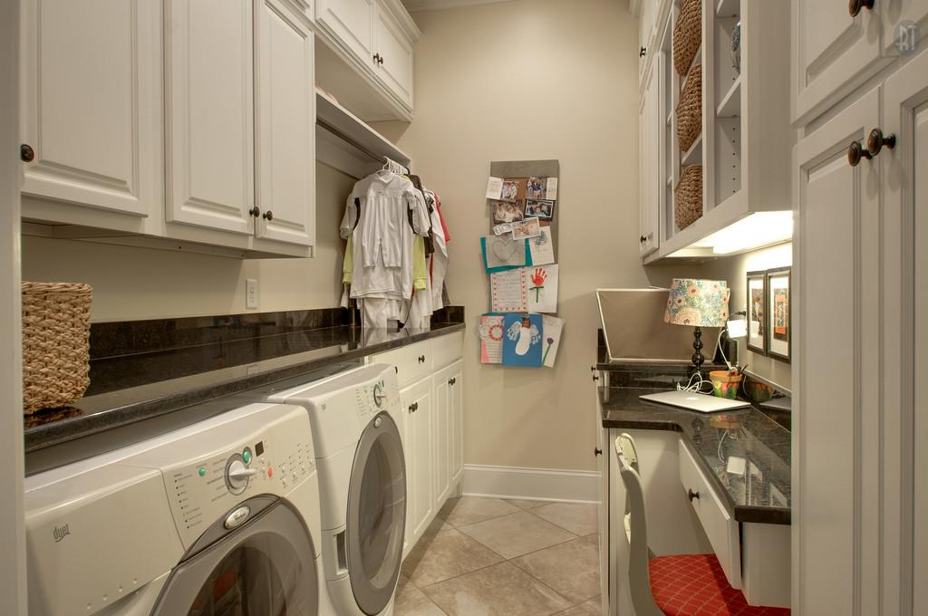 406 Page Road Nashville, TN 37205 - Photo 7 of 22 a view of a kitchen with fridge and workspace