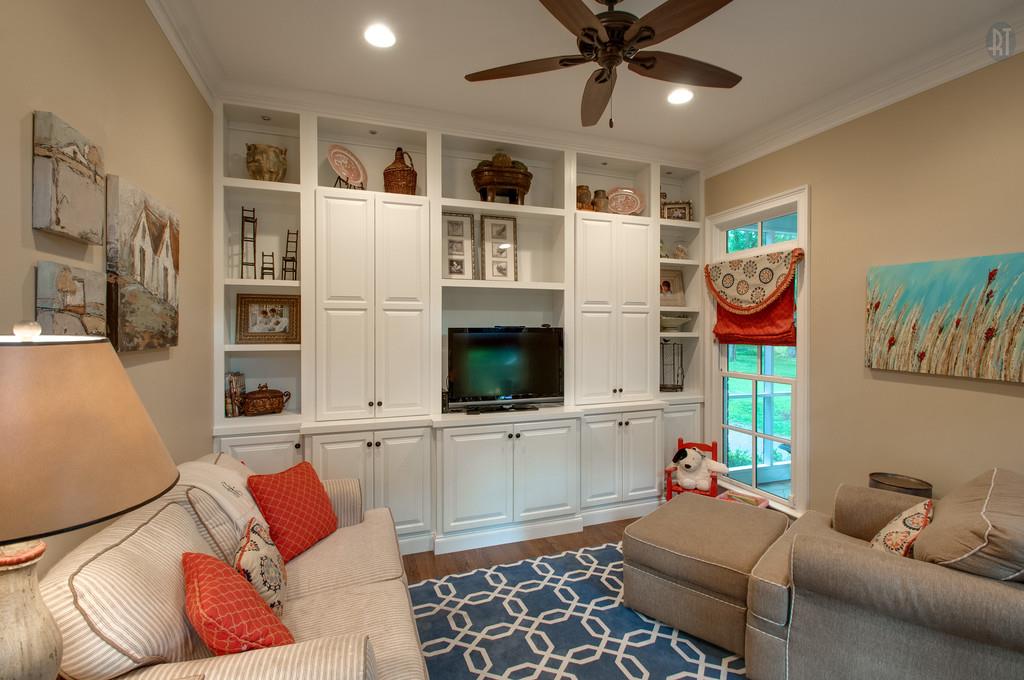406 Page Road Nashville, TN 37205 - Photo 8 of 22 a living room with furniture and a flat screen tv