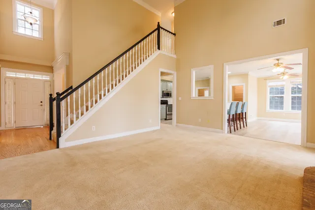 a view of a hallway with staircase
