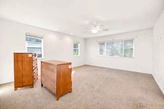 a bathroom with a sink a mirror and a bathtub