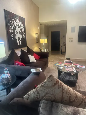 a living room with furniture and couch