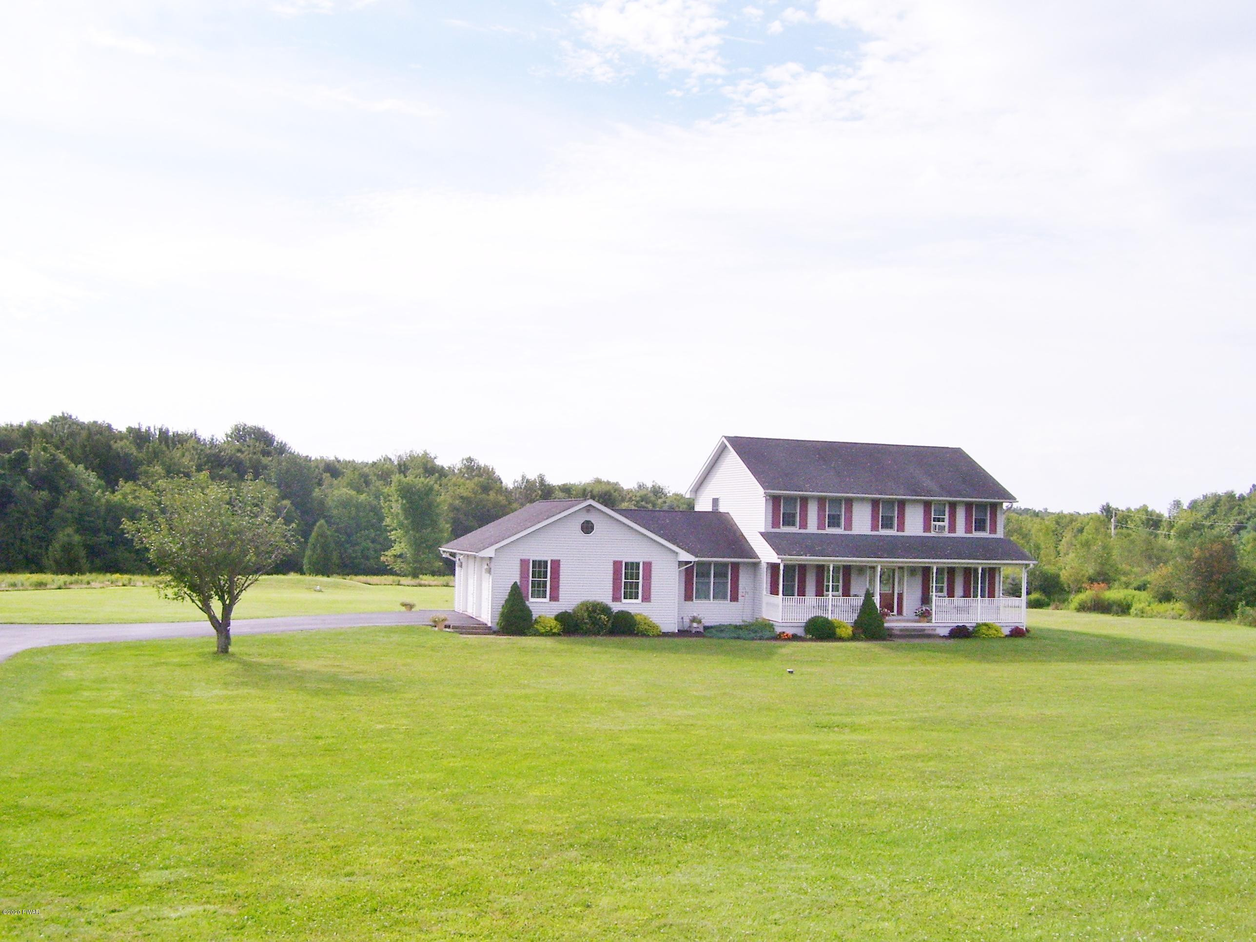 50 Layton Road Waymart, PA 18472 - Photo 3 of 61 a view of a house with a big yard