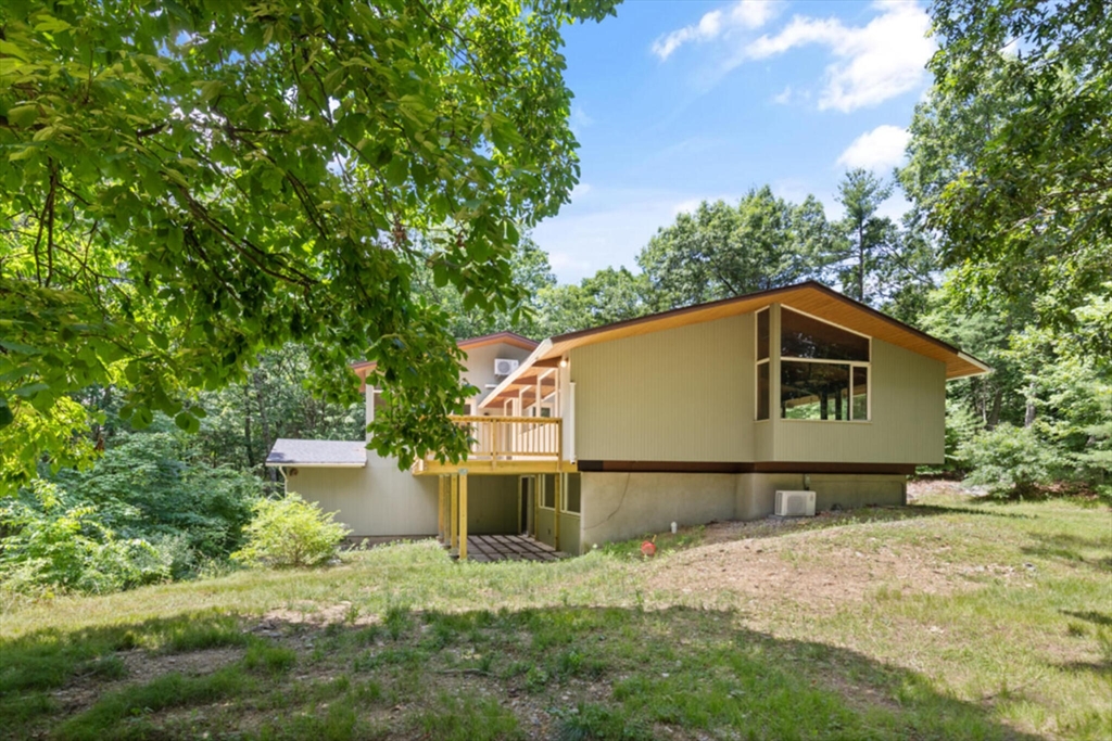 15 Pilgrims Path Sudbury, MA 01776 - Photo 26 of 29 a house with trees in the background