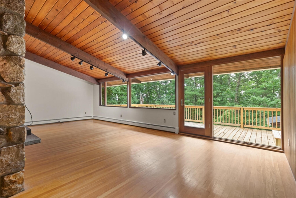 15 Pilgrims Path Sudbury, MA 01776 - Photo 5 of 29 a view of a patio with wooden floor