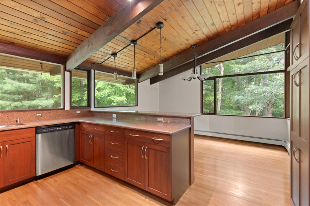15 Pilgrims Path Sudbury, MA 01776 - Photo 10 of 29 a kitchen with a sink and a large window