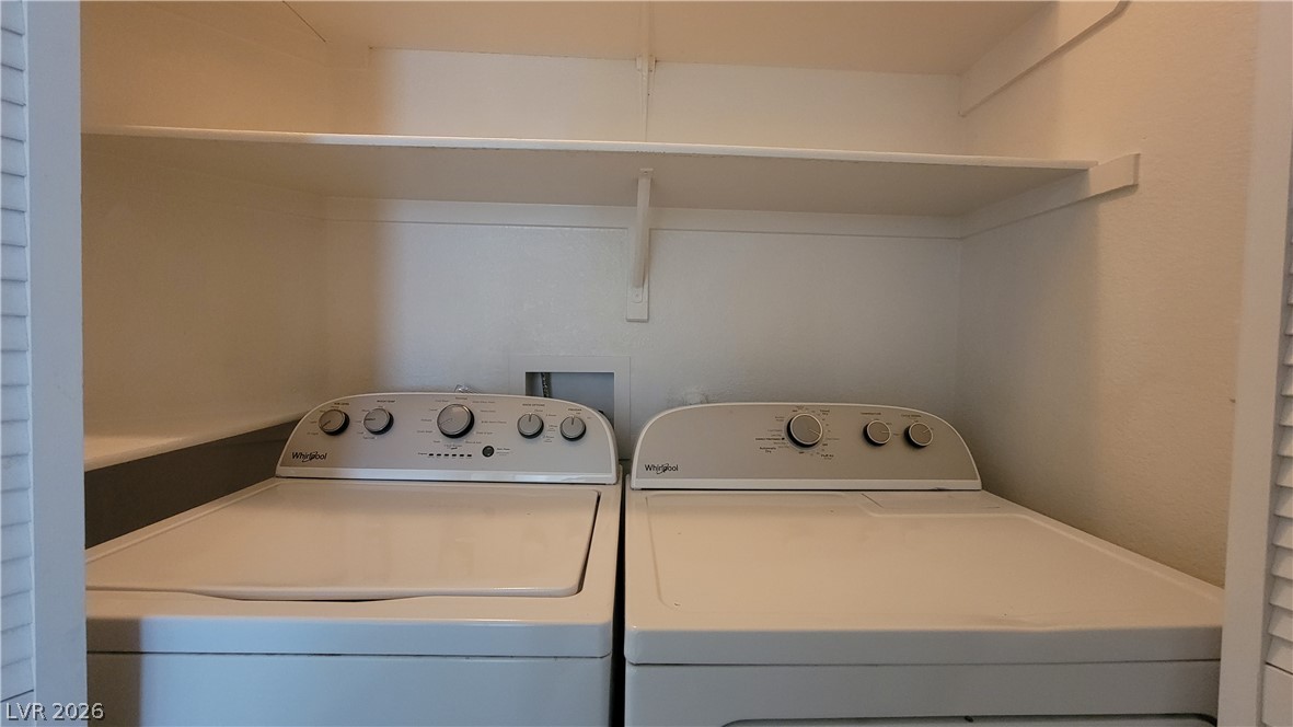 3320 South Fort Apache Road, Unit 111 Las Vegas, NV 89117 - Photo 10 of 12 A dedicated laundry space provides practical, in-home convenience.