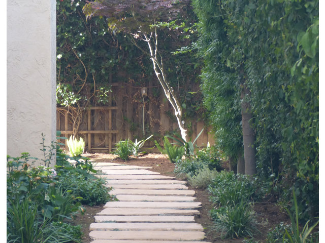 686 Regas Drive Campbell, CA 95008 - Photo 7 of 8 a view of a bench in a backyard