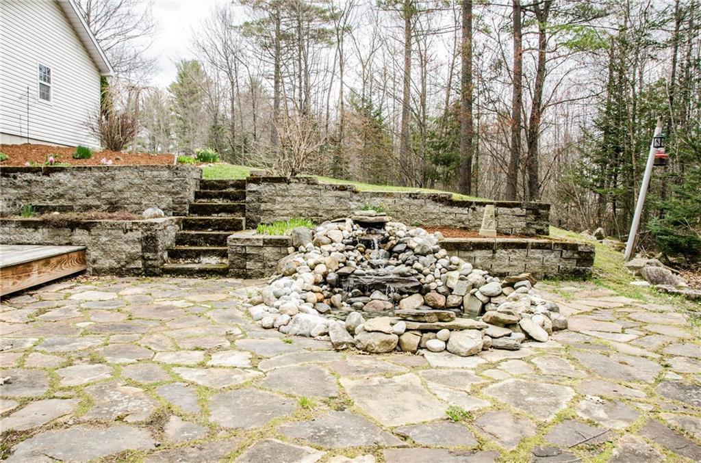 38 Partridge Place Augusta, ME 04330 - Photo 30 of 33 Large patio with water feature