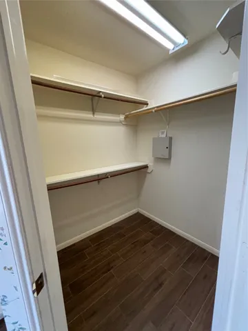 a view of an empty walk in closet