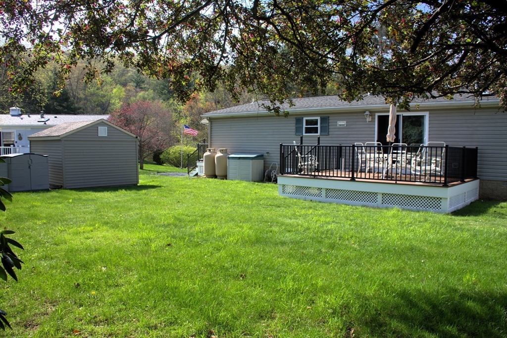 20 Deer Run Brookfield, MA 01506 - Photo 4 of 29 a house view with a sitting space and garden