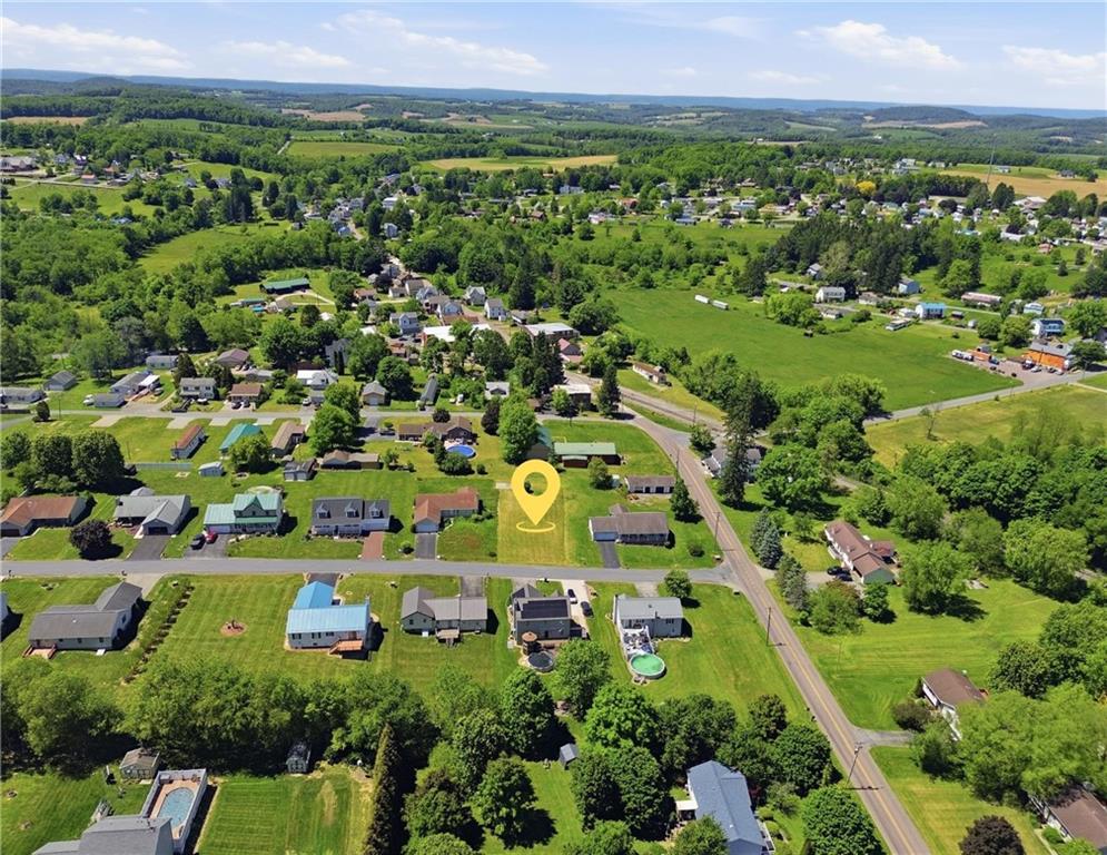 2 Ajit Friedens, PA 15541 - Photo 8 of 14 an aerial view of residential houses with outdoor space and trees all around