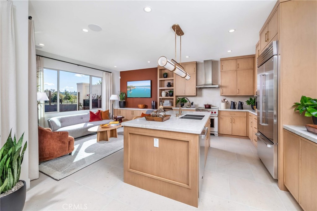 265 Raffini Irvine, CA 92618 - Photo 2 of 7 Open kitchen & Great Room in Plan 2 model home