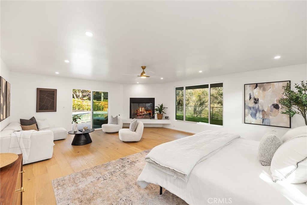 1848 North Altadena Drive Pasadena, CA 91107 - Photo 16 of 45 a bedroom with a large bed and a couch