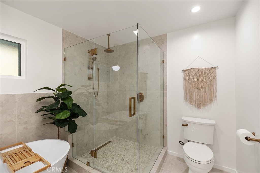 1848 North Altadena Drive Pasadena, CA 91107 - Photo 20 of 45 a bathroom with a shower a toilet and a shower