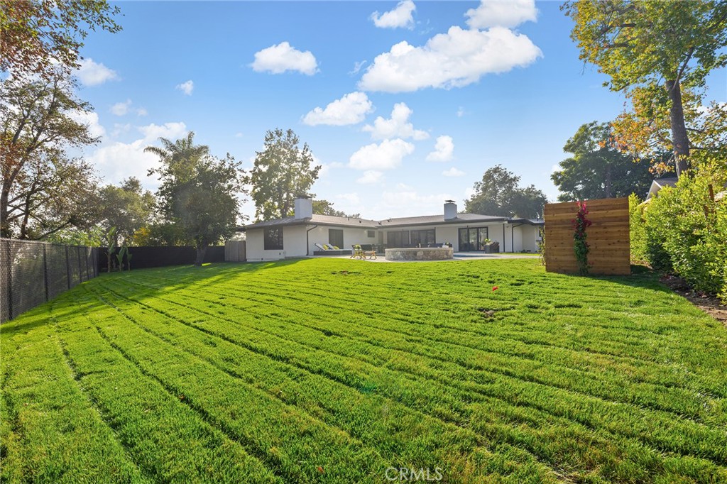 1848 North Altadena Drive Pasadena, CA 91107 - Photo 30 of 45 a swimming pool with wooden fence