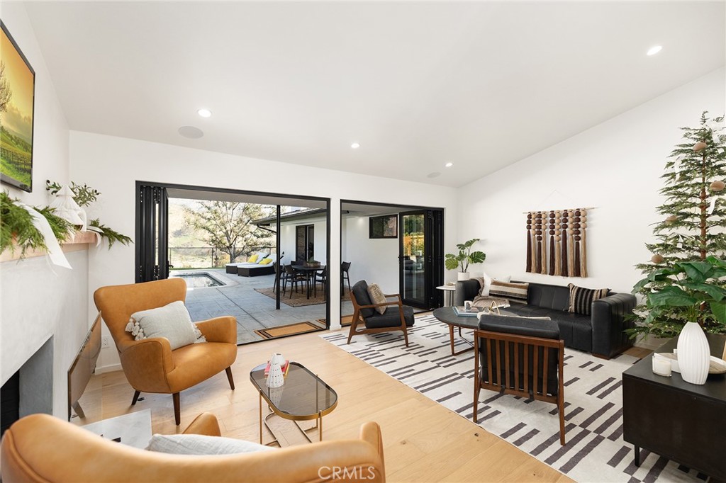 1848 North Altadena Drive Pasadena, CA 91107 - Photo 5 of 45 a living room with furniture and a large window