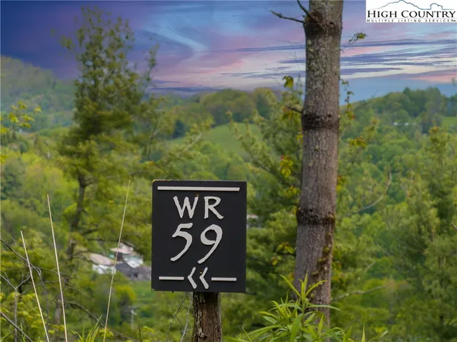 a sign broad on the side of the road