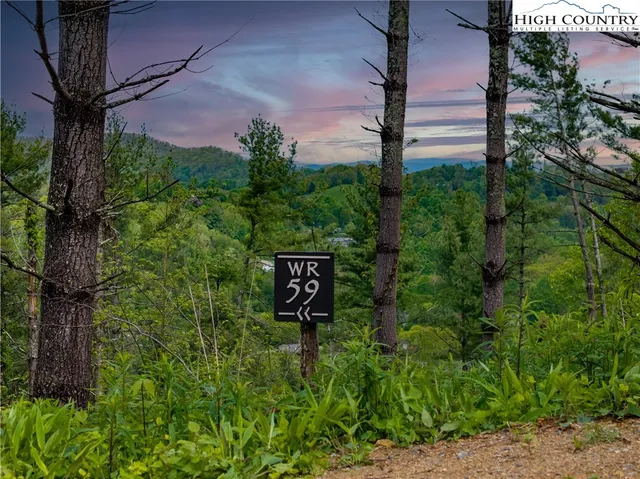 a sign on the side of a road