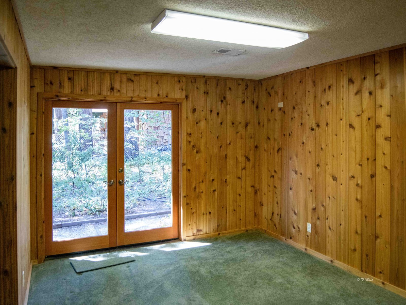 25970 Cedar Street Idyllwild, CA 92549 - Photo 19 of 28 a view of an empty room and window