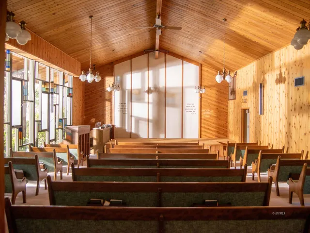 a living room with large windows