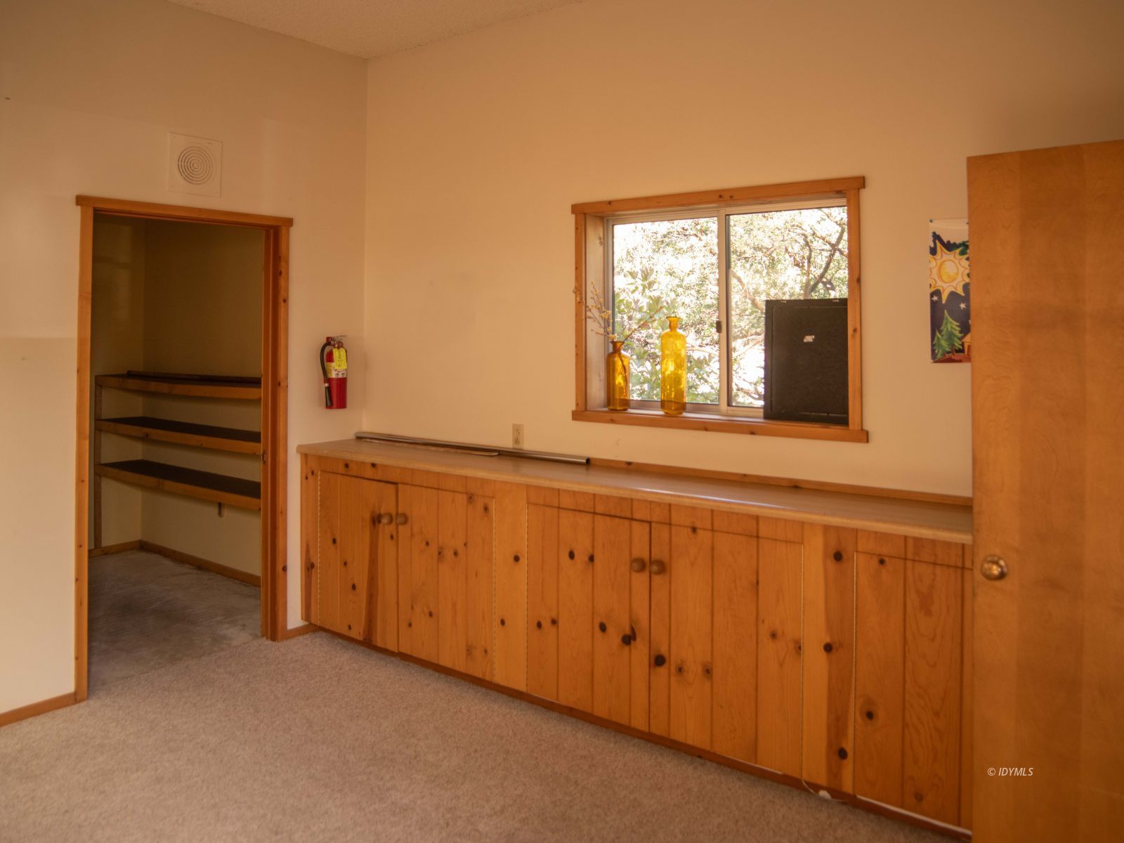 25970 Cedar Street Idyllwild, CA 92549 - Photo 23 of 28 a view of an empty room with a window