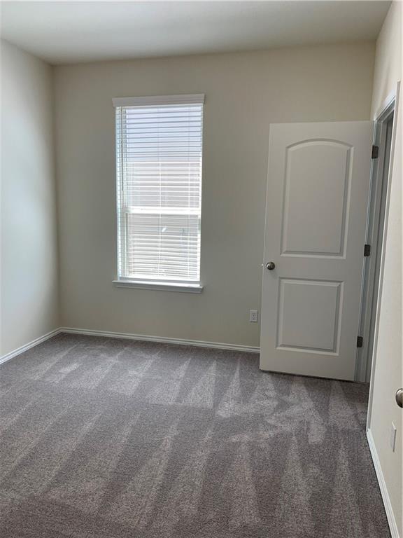 1229 Cliffbrake Way Georgetown, TX 78626 - Photo 13 of 24 an empty room with a window