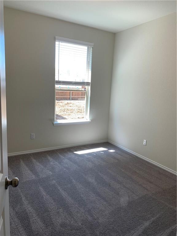 1229 Cliffbrake Way Georgetown, TX 78626 - Photo 14 of 24 an empty room with a window