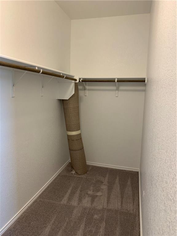 1229 Cliffbrake Way Georgetown, TX 78626 - Photo 18 of 24 a view of a room with racks on the wall