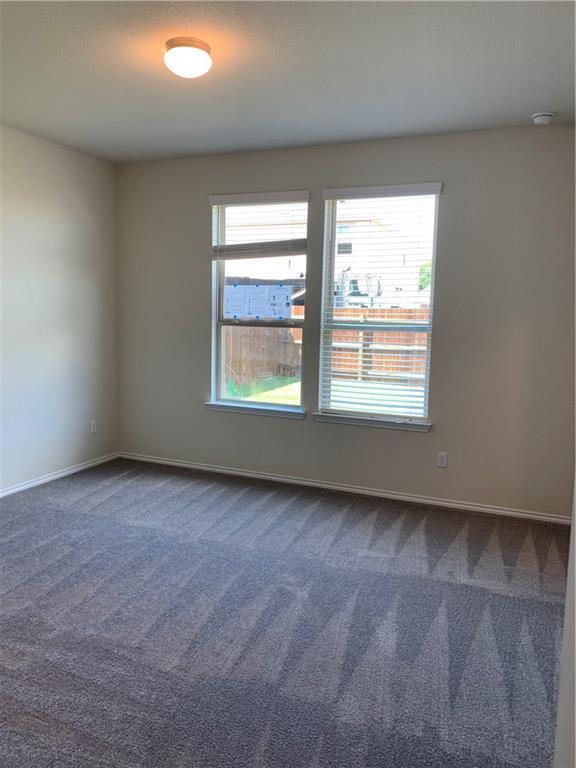 1229 Cliffbrake Way Georgetown, TX 78626 - Photo 9 of 24 an empty room with a window