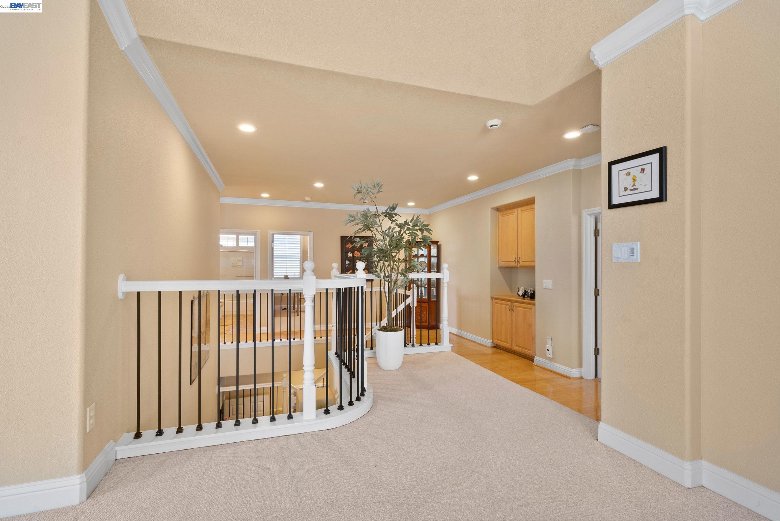 4717 Chestnut Court Dublin, CA 94568 - Photo 24 of 60 a view of a hallway with a livingroom and entryway