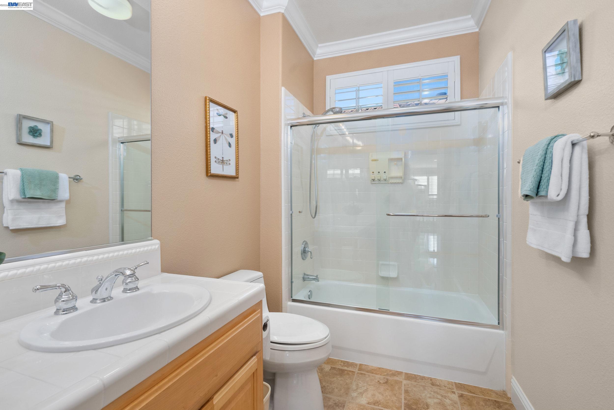 4717 Chestnut Court Dublin, CA 94568 - Photo 44 of 60 a bathroom with a sink toilet and shower