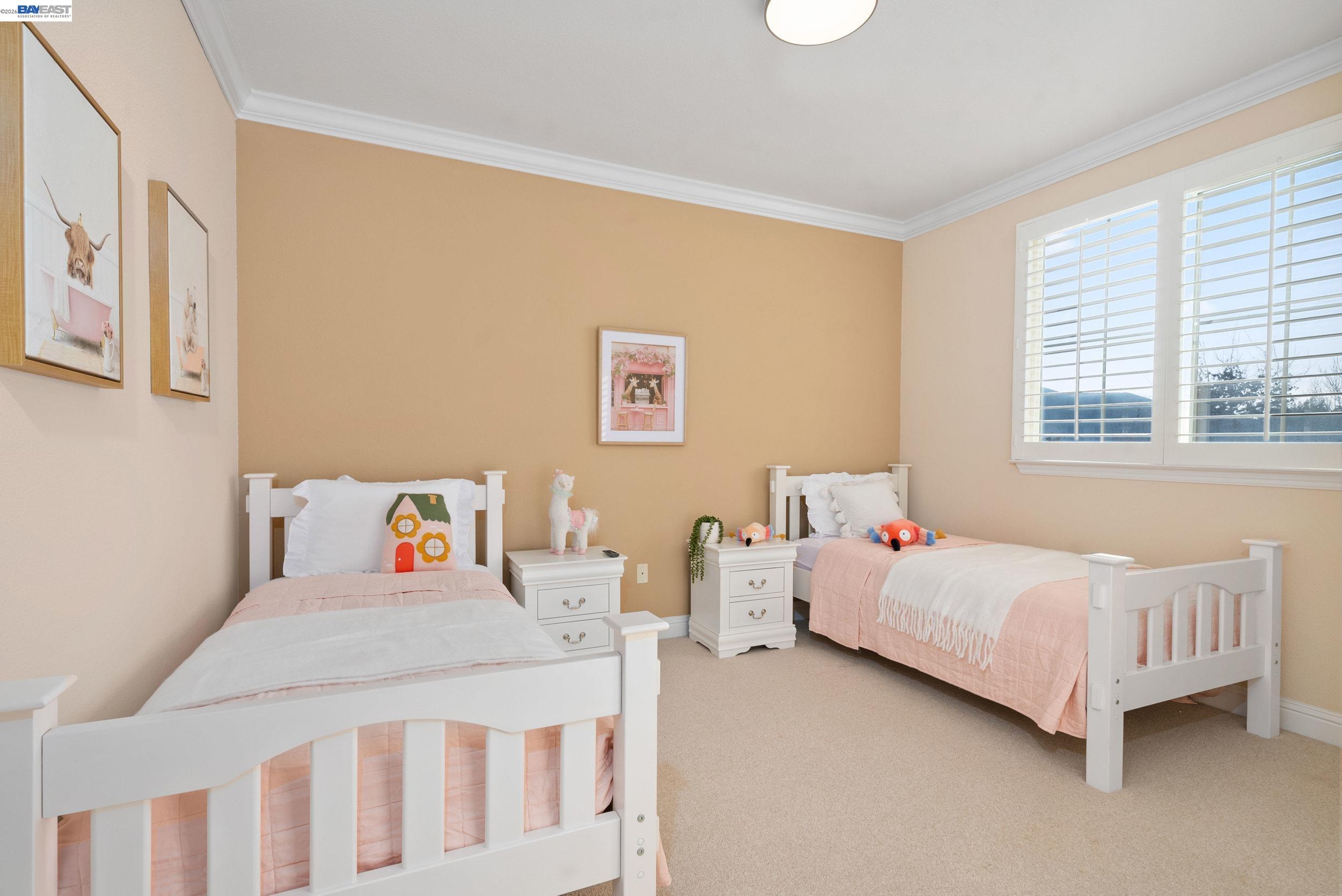 4717 Chestnut Court Dublin, CA 94568 - Photo 48 of 60 a bedroom with a bed and a window