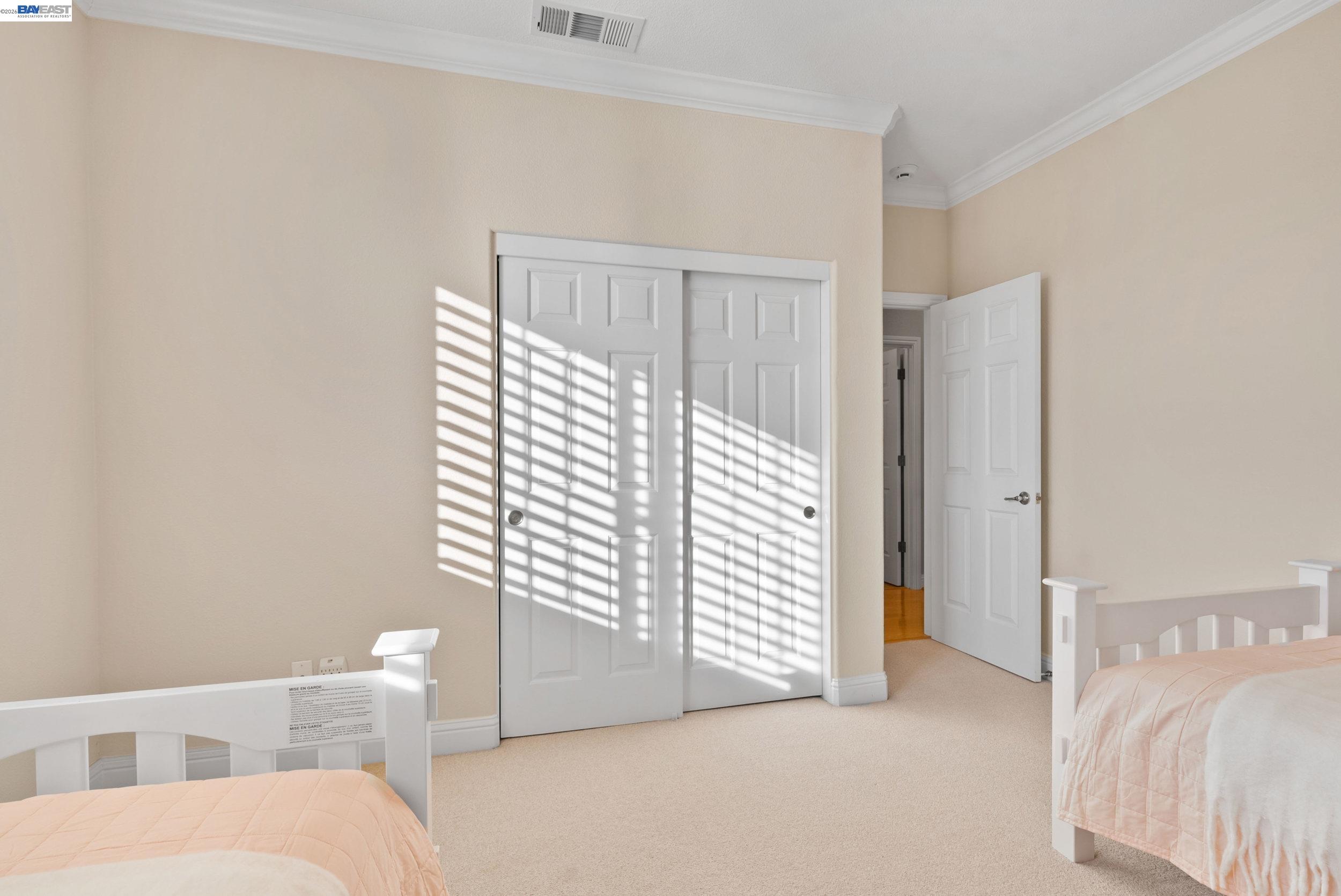 4717 Chestnut Court Dublin, CA 94568 - Photo 49 of 60 a view of a bedroom with furniture and windows
