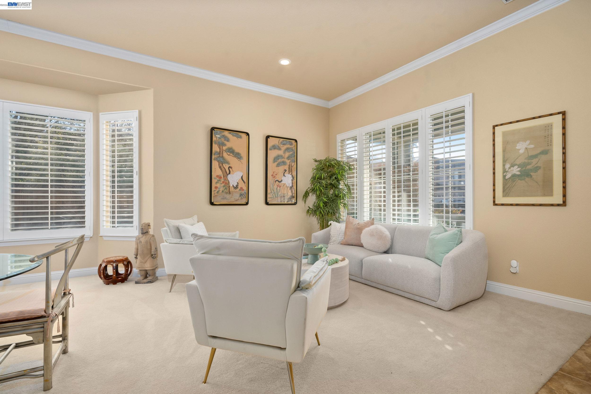 4717 Chestnut Court Dublin, CA 94568 - Photo 8 of 60 a living room with furniture and a large window