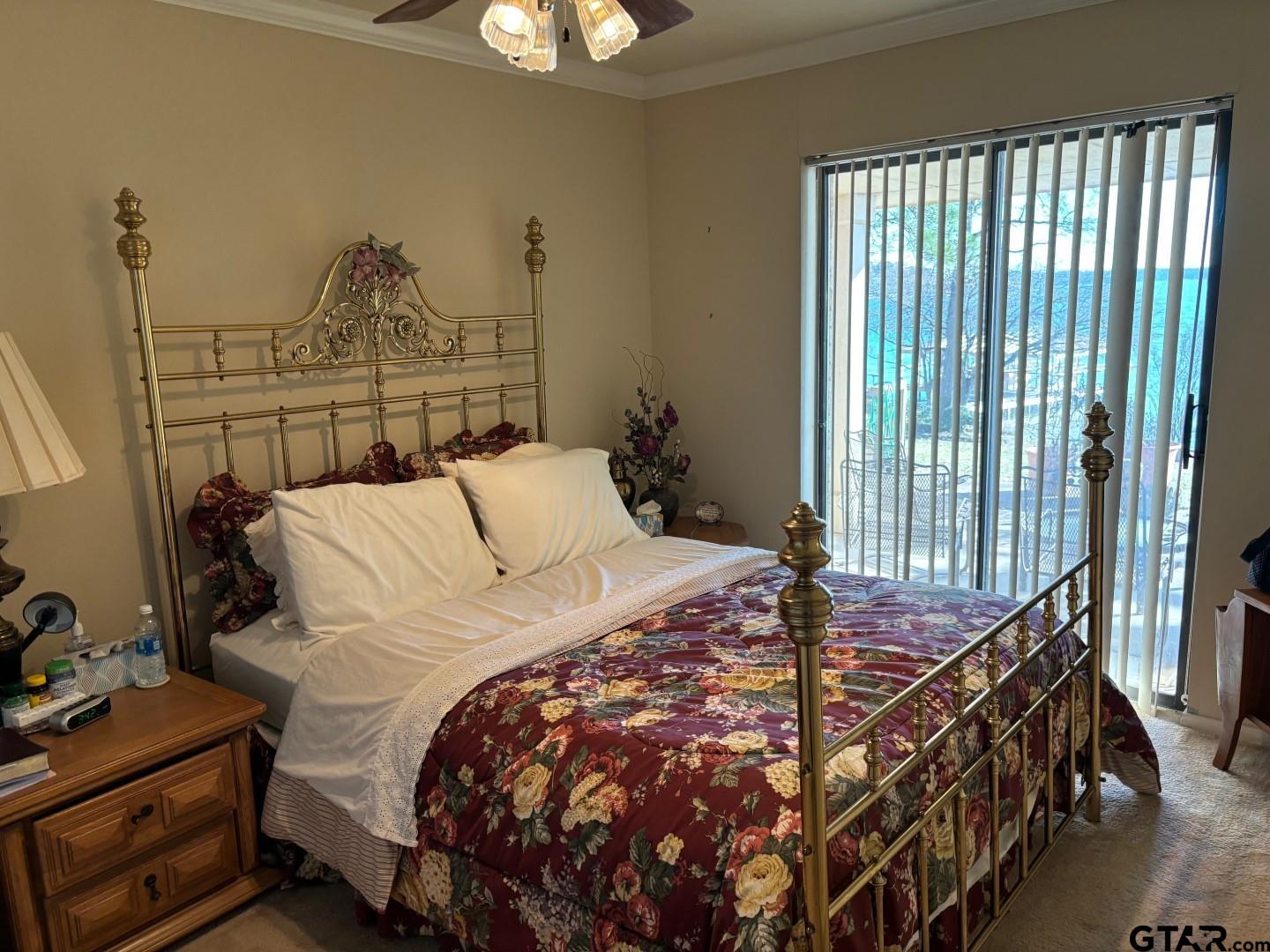 17656 Old River Road Flint, TX 75762 - Photo 18 of 20 a bedroom with a bed and wooden floor