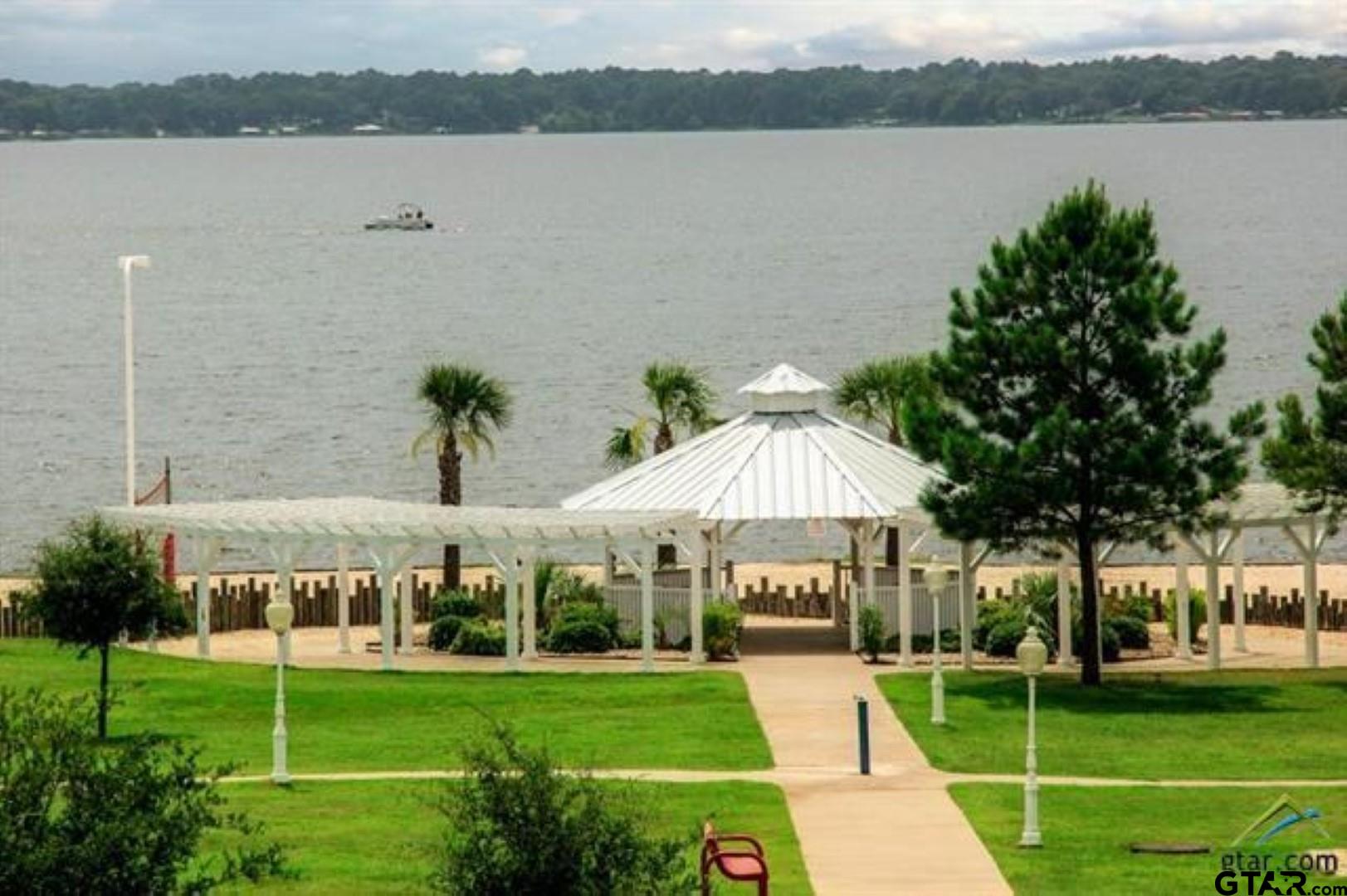 17656 Old River Road Flint, TX 75762 - Photo 7 of 20 a view of a lake with houses in the background