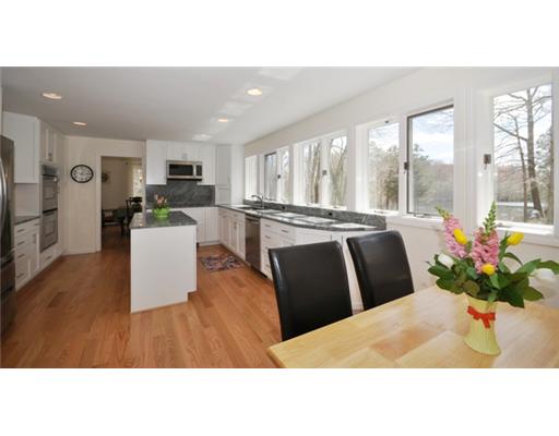 4 Ranger Court Jamestown, RI 02835 - Photo 4 of 12 Kitchen. NEW CUSTOM KITCHEN...KITCHEN LEADING TO DINING ROOM (pocket door) WITH SLIDERS ONTO LARGE ENTERTAINING DECK.