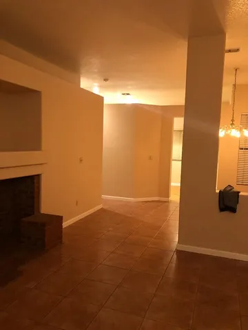 a kitchen with a sink cabinets and appliances