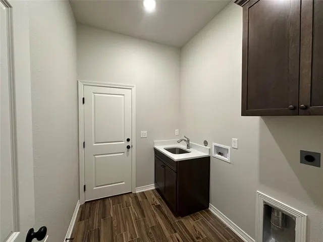 a bathroom with a sink and toilet